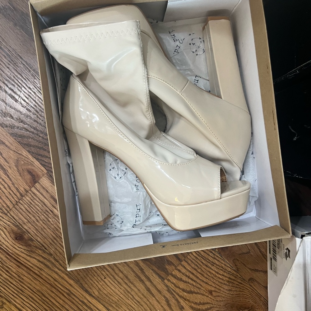 Open wedge cream boot by Cape Robbin